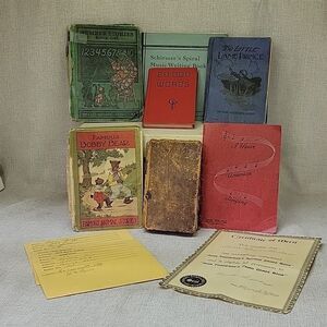 7 vintage school books and report cards